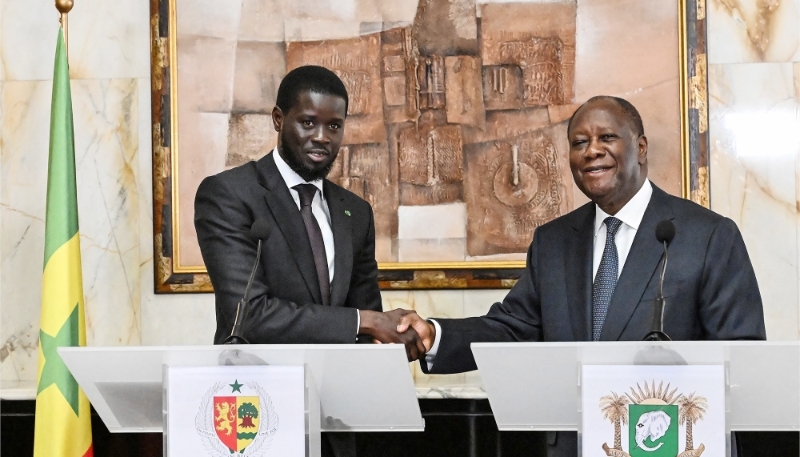 Bassirou Diomaye Faye et Alassane Ouattara au palais présidentiel d'Abidjan, le 7 mai 2024.