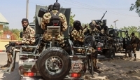 Des soldats de la Nigerian Army en patrouille, à Maiduguri, dans le nord-est du Nigeria, en mars 2026.