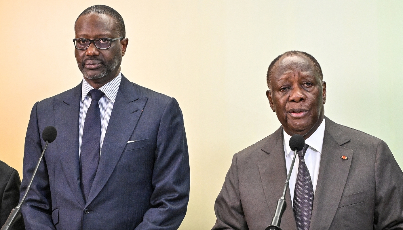 Le président ivoirien, Alassane Ouattara (à dr.), et le président du Parti démocratique de Côte d'Ivoire, Tidjane Thiam, à Abidjan, le 11 mars 2024.