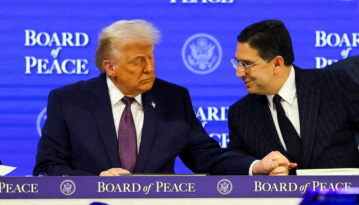 Le président américain, Donald Trump, et le ministre des affaires étrangères marocain, Nasser Bourita, à Davos, en Suisse, le 22 janvier 2026.