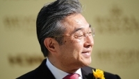 L'ambassadeur japonais Hiroshi Suzuki à l'hippodrome d'Ascot, au Royaume-Uni, le 18 juin 2026.