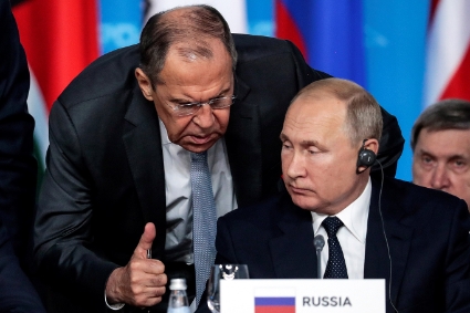 Le chef de la diplomatie russe Sergueï Lavrov et le président russe Vladimir Poutine.
