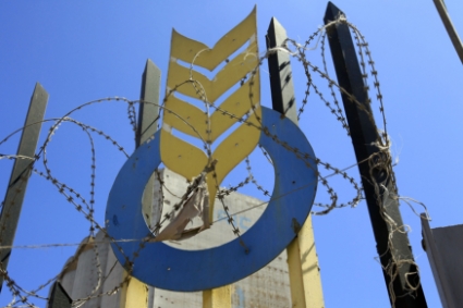 Le logo de l'Office algérien interprofessionnel des céréales (OAIC) sur un silo dans le port d'Alger.