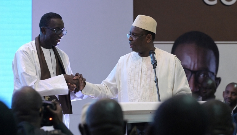 Le président sénégalais Macky Sall et son premier ministre Amadou Ba, à Dakar, le 21 décembre 2023.